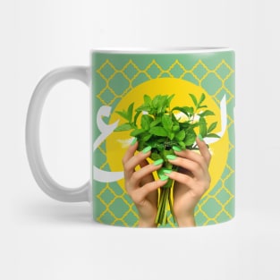 Hands holding bouquet of Mint Mug